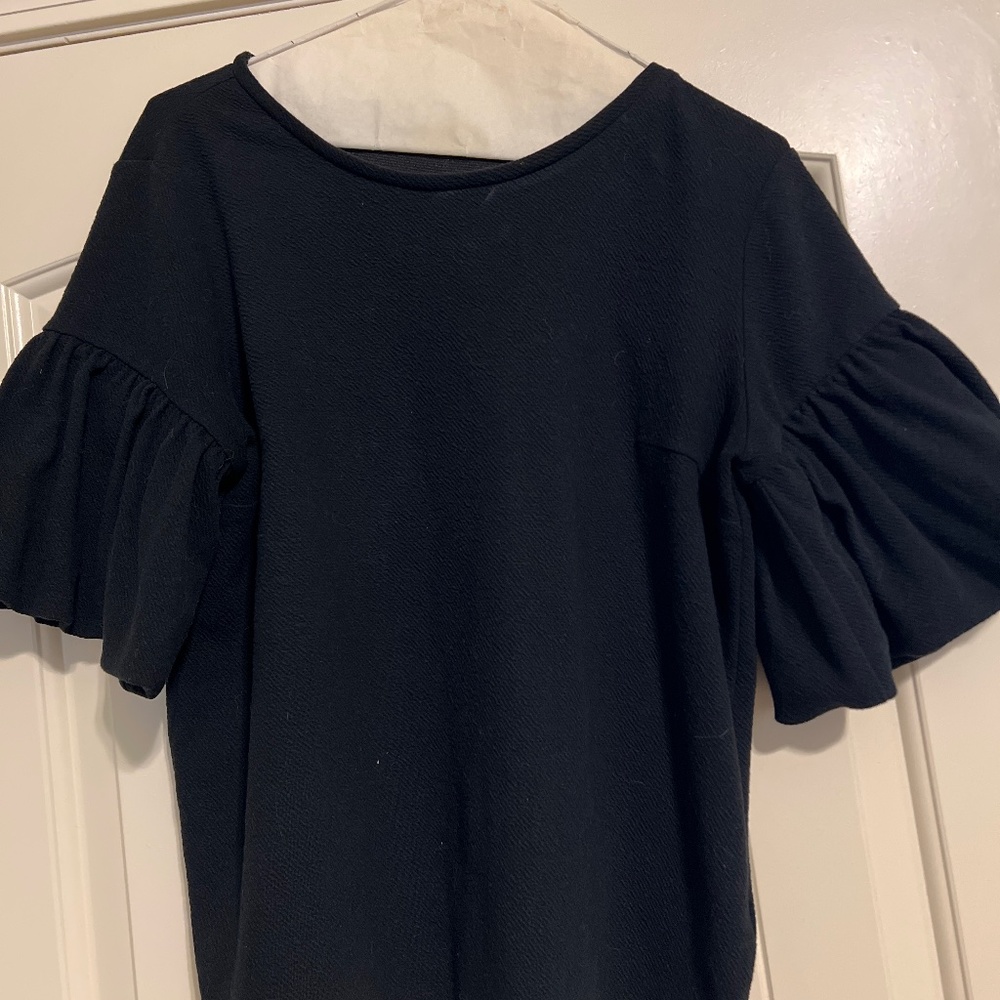 Express flows sleeve top